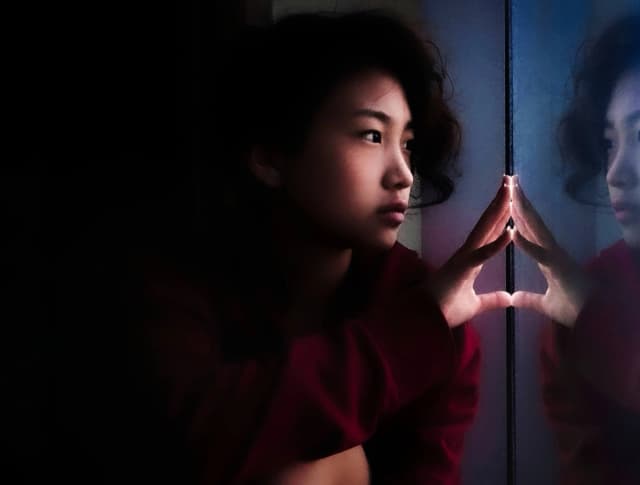 Photo of a girl's reflection